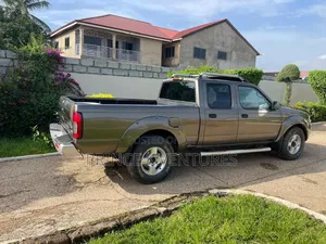 Nissan Frontier SE-V6 4x4 Long Bed Crew Cab 131 in. WB 2002 Brown