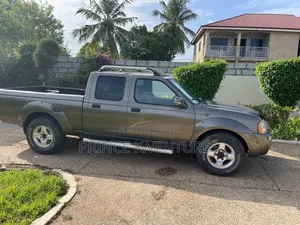 Nissan Frontier SE-V6 4x4 Long Bed Crew Cab 131 in. WB 2002 Brown