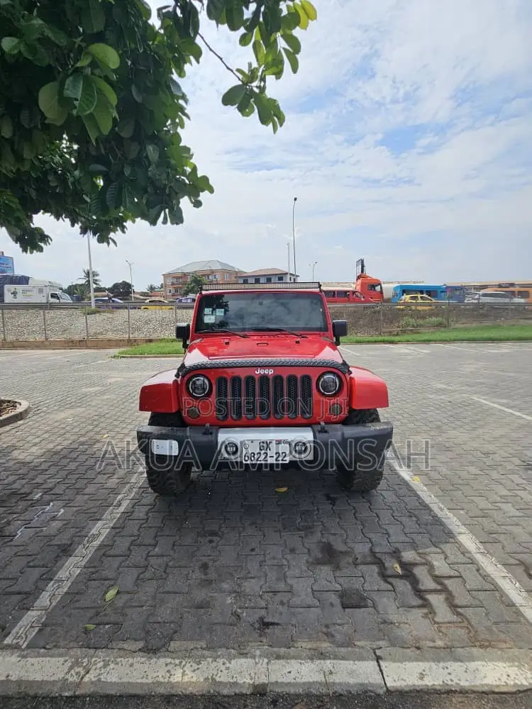 Jeep Wrangler Unlimited Sport 4dr SUV 4WD (3.6L 6cyl 6M) 2014 Red