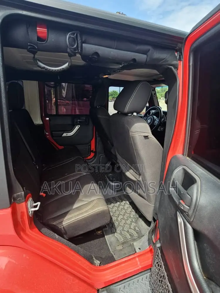 Jeep Wrangler Unlimited Sport 4dr SUV 4WD (3.6L 6cyl 6M) 2014 Red