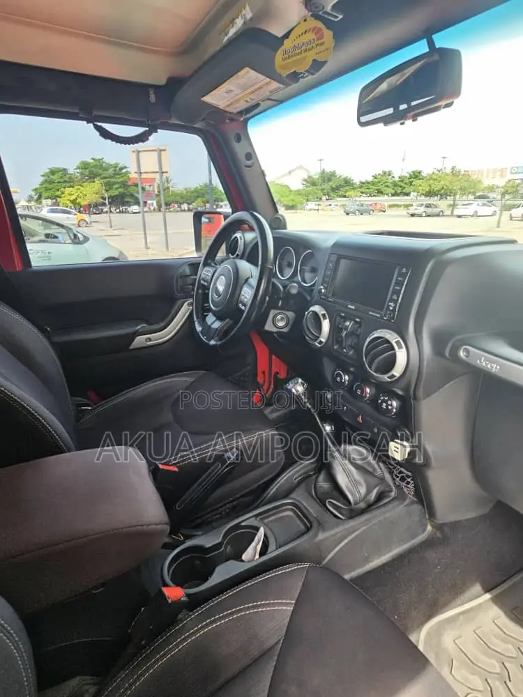 Jeep Wrangler Unlimited Sport 4dr SUV 4WD (3.6L 6cyl 6M) 2014 Red