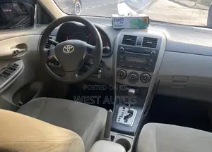 Toyota Corolla LE 4dr Sedan (1.8L 4cyl 4A) 2010 Beige