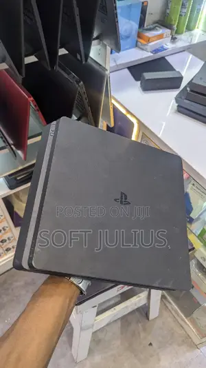 Playstation Fr Slim With Fc26 and 7 More Games With 2 Controllers.