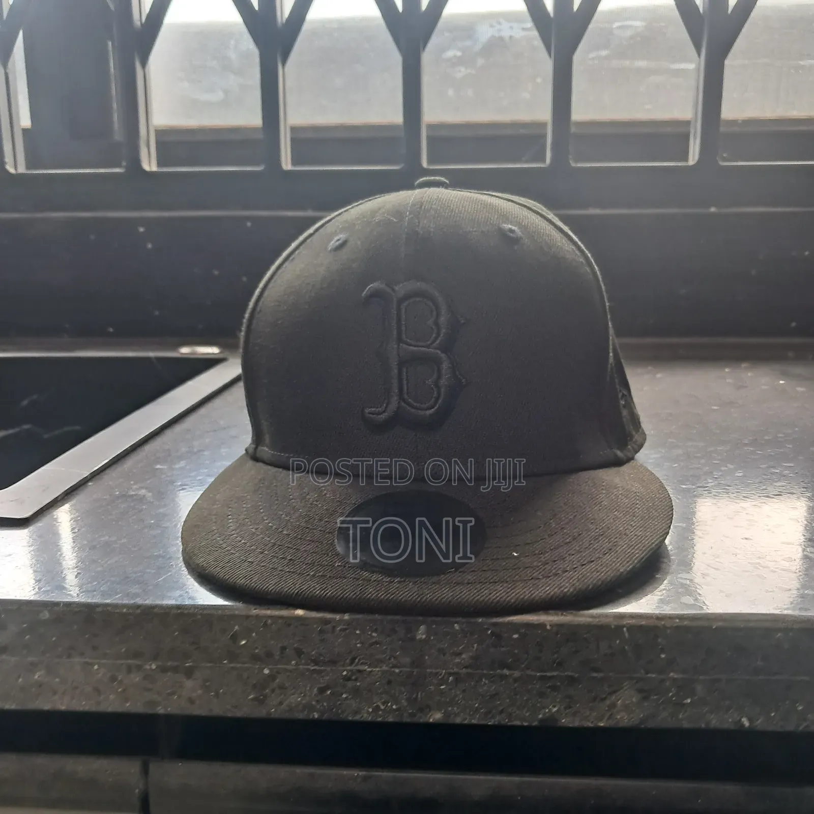 "Boston Red Sox Black-on-Black Snapback Cap – Excellent Condition"