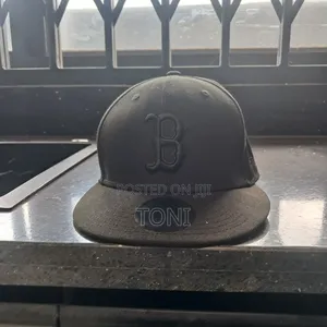 "Boston Red Sox Black-on-Black Snapback Cap – Excellent Condition"