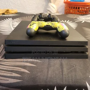 Ps4 Pro With Over 15 Games,500gb Storage and Two Original Controllers.