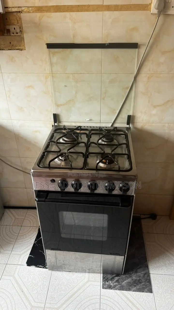 Used 4 Burner Gas and Electric Cooker With Oven
