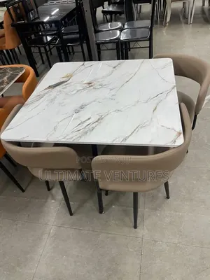 Modern 4-Seater Black Marble Dining Set With Orange Chairs