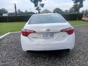 Toyota Corolla LE 4dr Sedan (1.8L 4cyl CVT) 2014 White