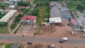 Tittled 14 Plots Block Factory on Dodowa Main Road
