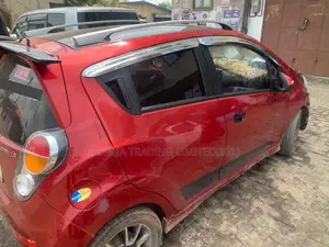 Chevrolet Spark 2LT 4dr Hatchback (1.2L 4cyl CVT) 2014 Red