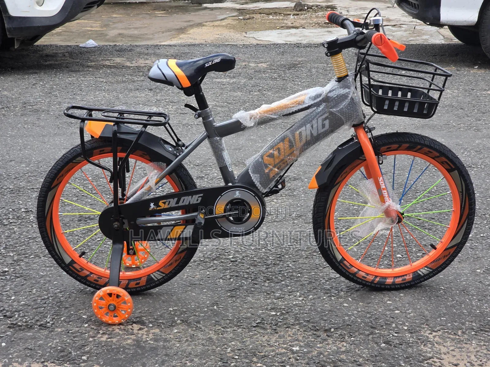 Solong Children's Bicycle Features Vibrant Orange Colour.