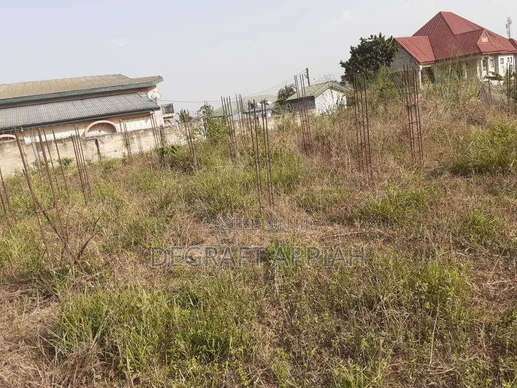 Main Road Double Plot for Sale at Mamponteng