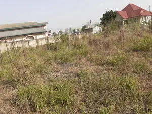 Main Road Double Plot for Sale at Mamponteng