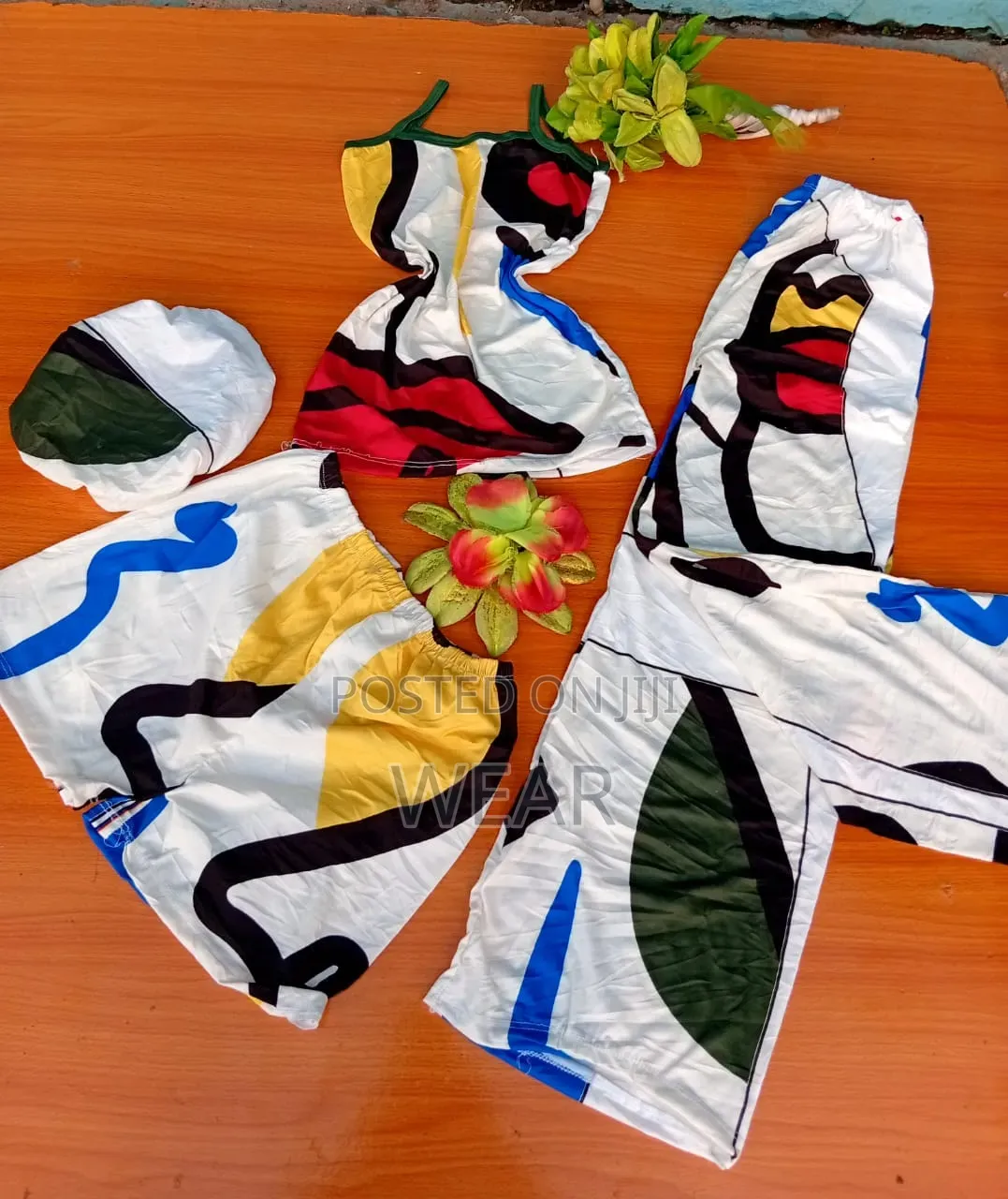 4 in 1 Nightwear
(
Bonnet ,Singlet,Shorts 
Trousers )