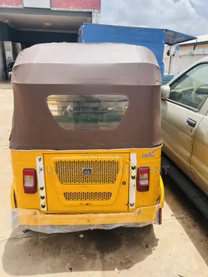 Bajaj RE 2024 Yellow