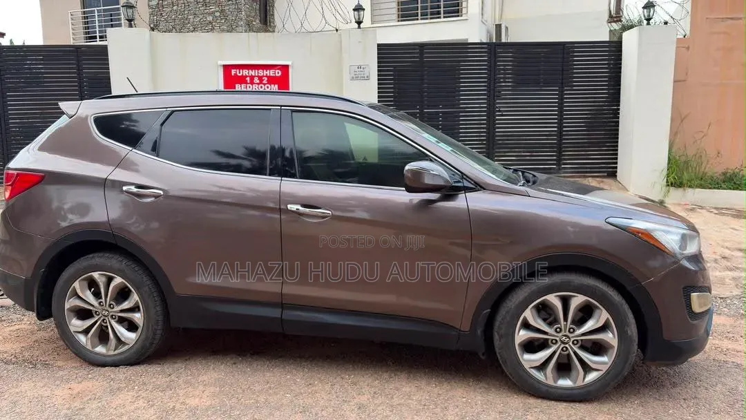 Hyundai Santa Fe Limited 4dr SUV AWD w/Saddle Interior (3.3L 6cyl 6A)