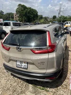 Honda CR-V Touring 4dr SUV AWD (1.5L 4cyl CVT) 2017 Brown