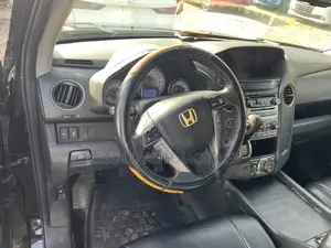 Honda Pilot Touring w/RES/Navi 4WD (3.5L 6cyl 5A) 2013 Black