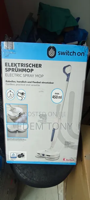 Switch on Cordless Electric Spray Mop With Blue Handle and White Base