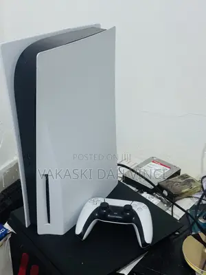 Selling Standard Ps5 With 5 Online Games And 1 Controller.