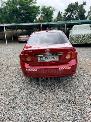 Toyota Corolla Base 4dr Sedan (1.8L 4cyl 5M) 2010 Red