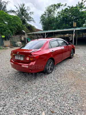 Toyota Corolla Base 4dr Sedan (1.8L 4cyl 5M) 2010 Red