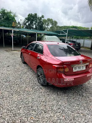 Toyota Corolla Base 4dr Sedan (1.8L 4cyl 5M) 2010 Red