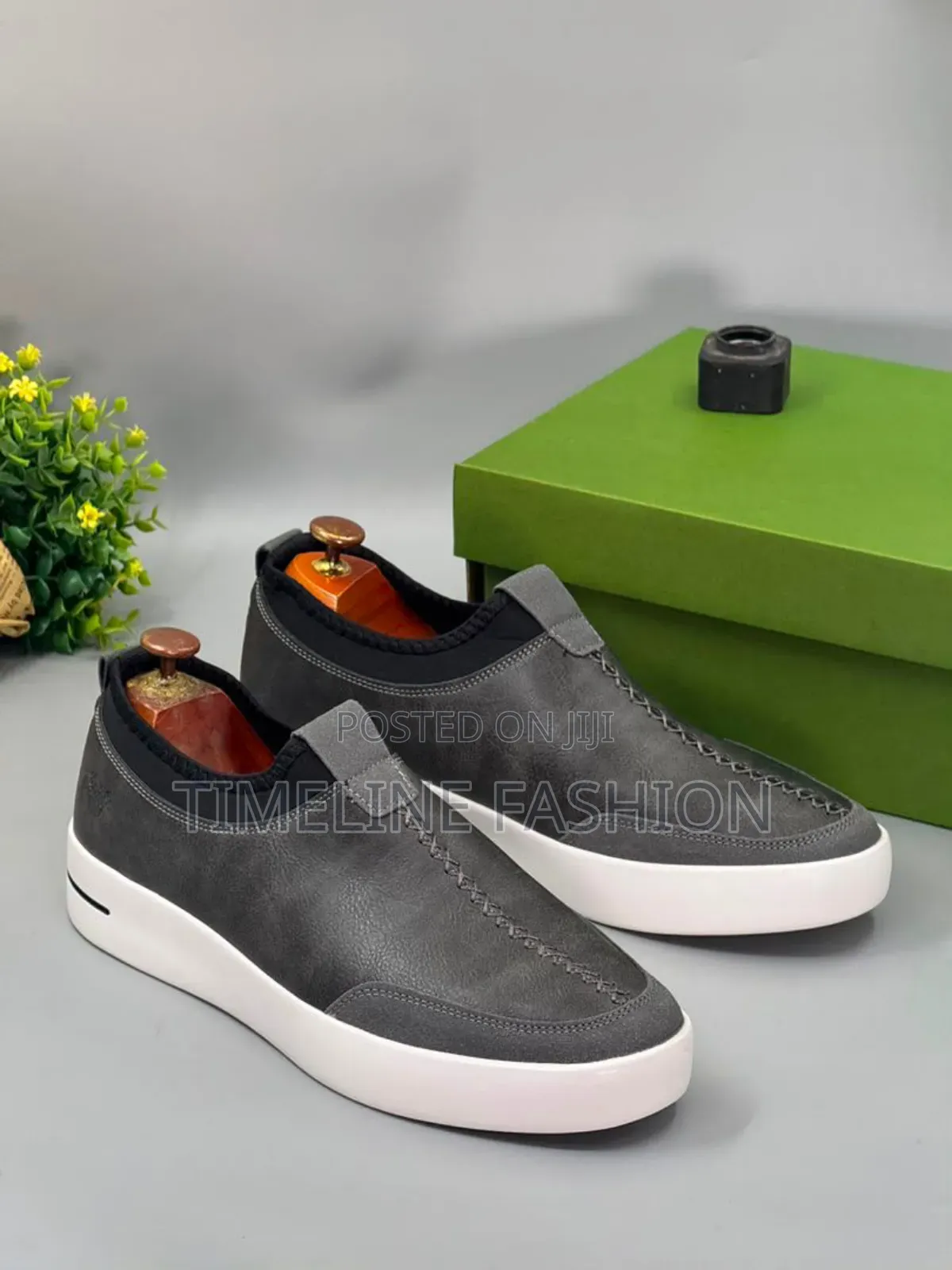 Gray and White Timberland Brand Full Grain Leather Sneakers