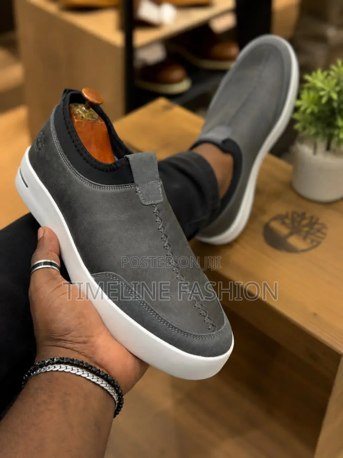 Gray and White Timberland Brand Full Grain Leather Sneakers