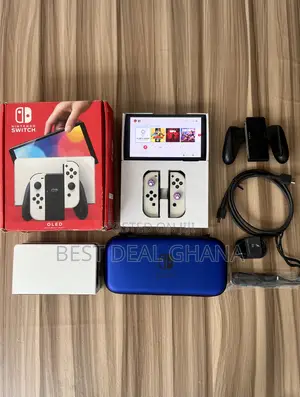 Nintendo Switch Oled With Games and Accessories