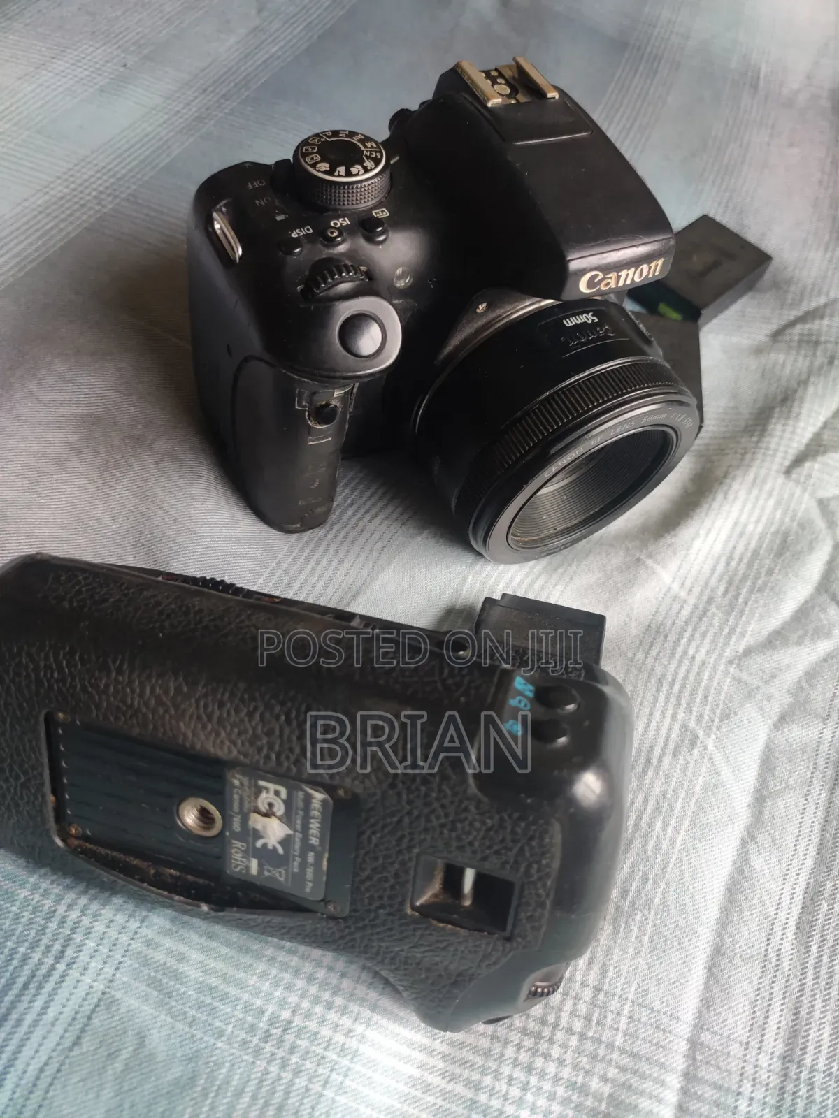 Canon T6i (Dark Region Around the Screen) + 50mm Prime Lens+ Batt Grip
