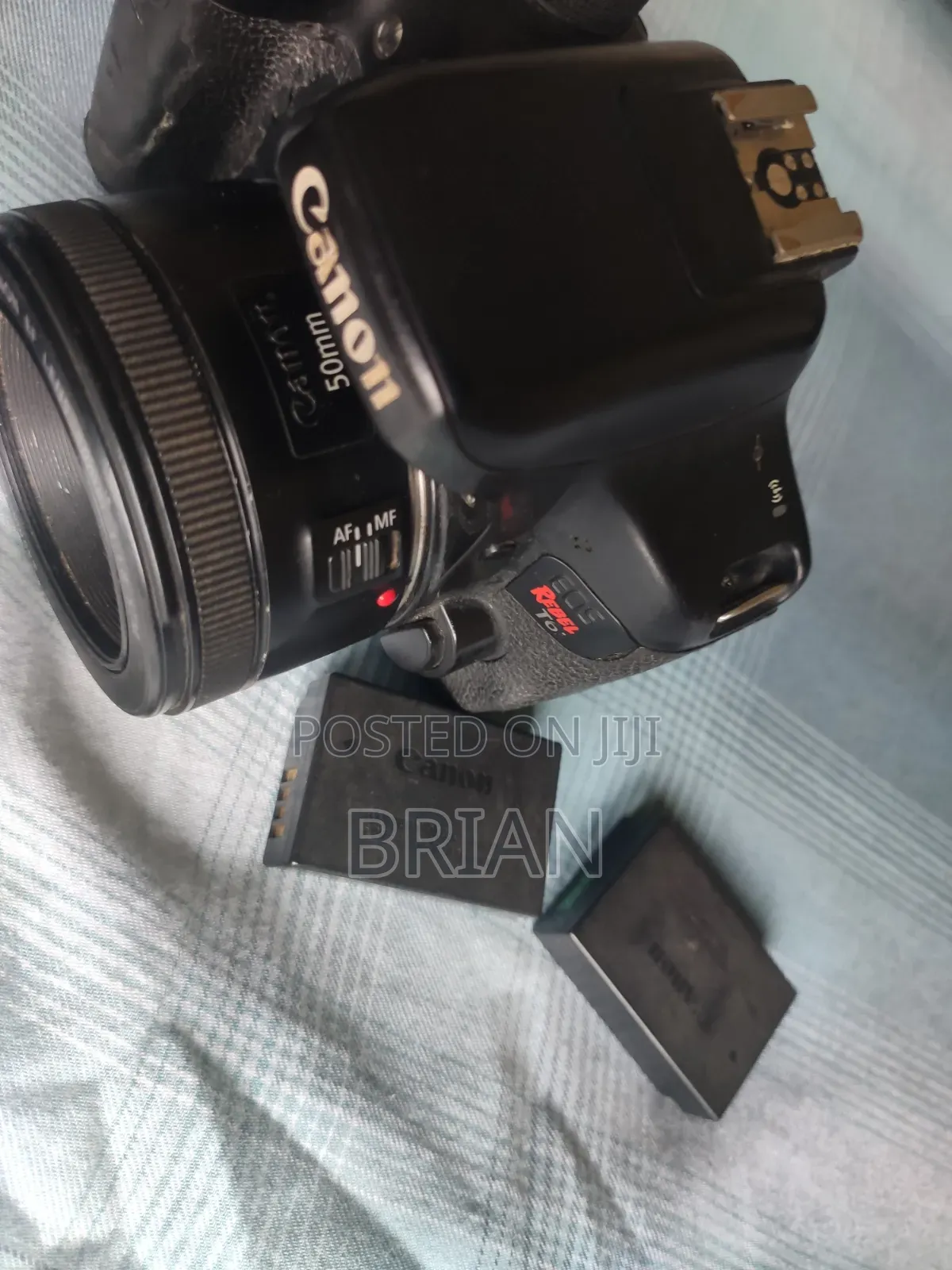 Canon T6i (Dark Region Around the Screen) + 50mm Prime Lens+ Batt Grip