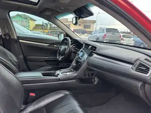 Honda Civic Touring 2dr Coupe (1.5L 4cyl) 2016 Red