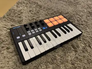 Professional Midi Keyboard 25 Keys With Drum Pad and Play/Pause/Record