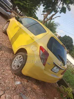 Toyota Vitz 2012 Yellow