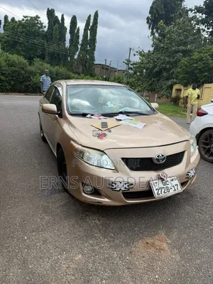Toyota Corolla Base 4dr Sedan (1.8L 4cyl 5M) 2010 Brown
