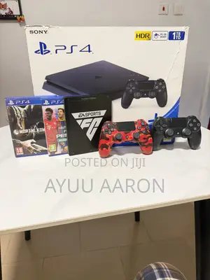 Brand New Ps4 Slim 1tb With Two Free Original Controllers and Games