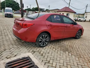 Toyota Corolla L (1.8L 4cyl 2A) 2019 Red