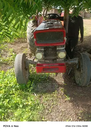A Tractor With Implements for Sale