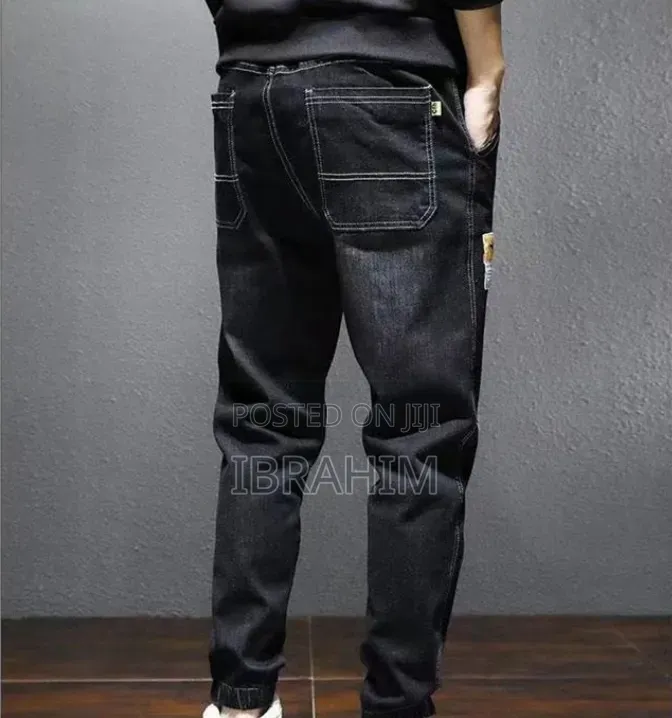 Comfortable Perforated & Elastic Jeans-styled Jogger Pants