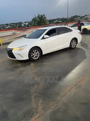 Toyota Camry LE (2.5L 4cyl 8A) 2019 White