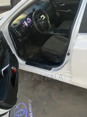 Toyota Camry LE (2.5L 4cyl 8A) 2019 White
