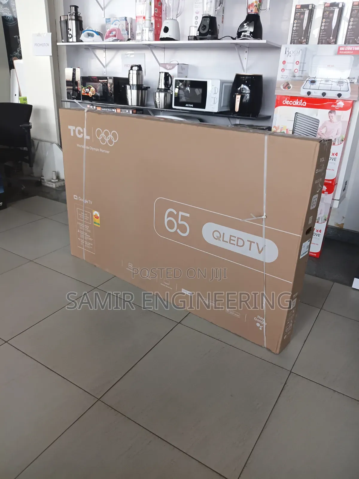 TCL 65" Qled: The Ultimate Home Theater Experience
