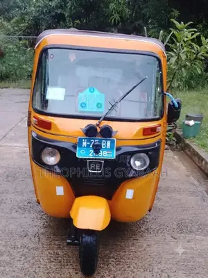 Bajaj RE 2024 Yellow