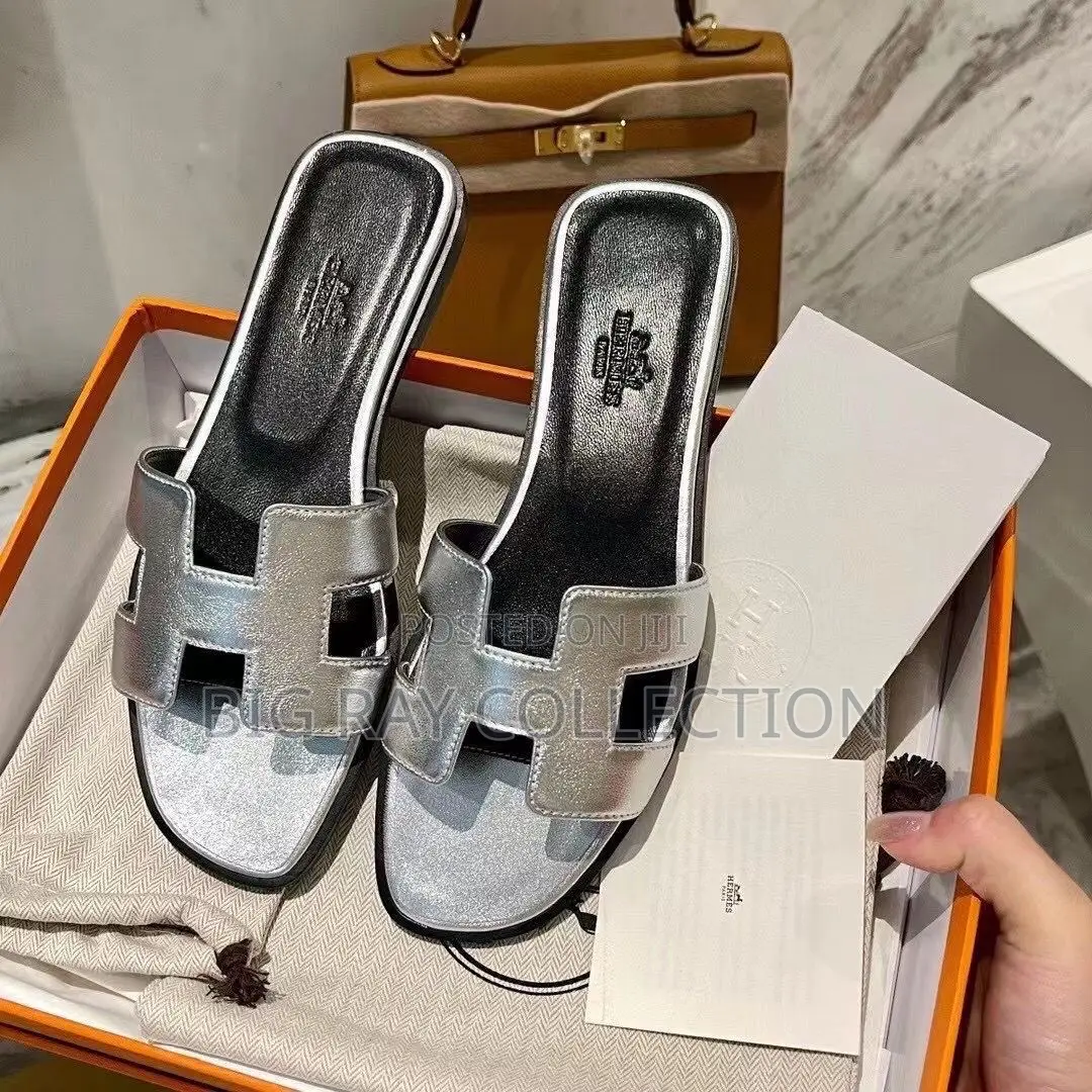 Lady’S Hermes Slippers Available in Colors >
