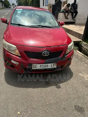 Toyota Corolla Base 4dr Sedan (1.8L 4cyl 5M) 2010 Red