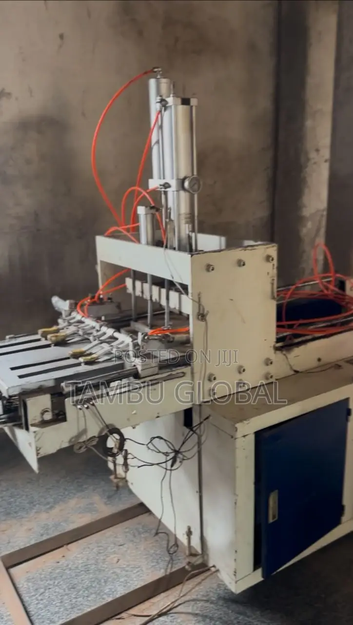 Automatic Plastic Bag Handle-Punching Stacking Machine — Tamale