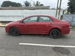 Toyota Corolla L 4dr Sedan (1.8L 4cyl 5M) 2013 Beige