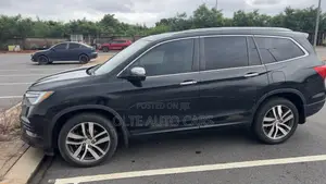 Honda Pilot Touring 4dr SUV 4WD (3.5L 6cyl 9A) 2017 Black
